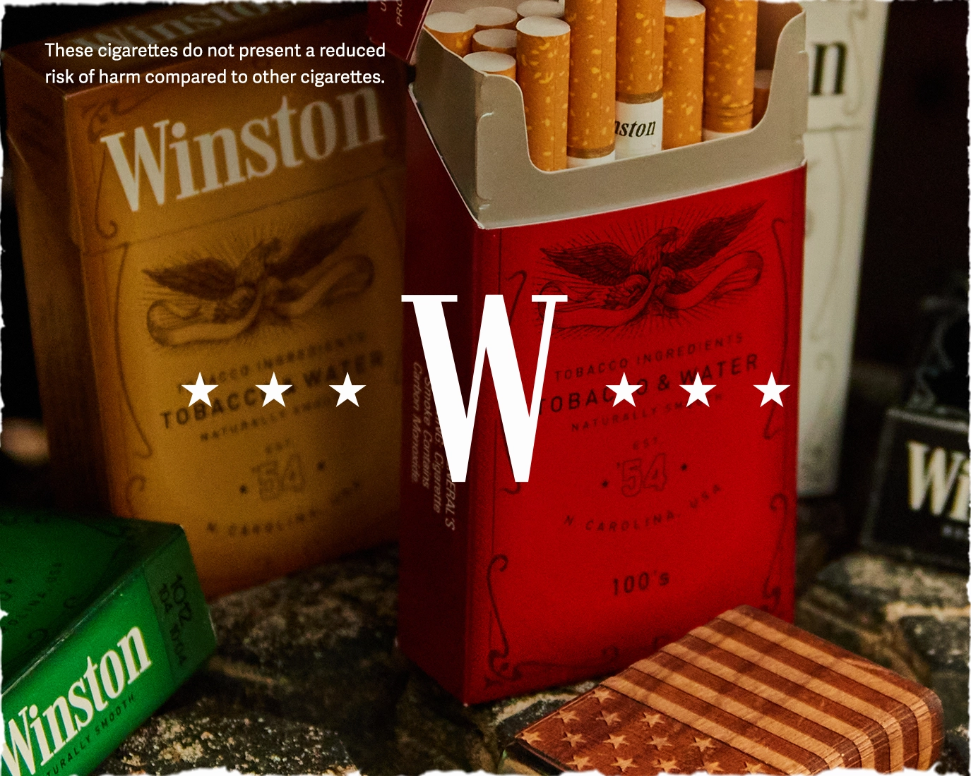 Packs of cigarettes overlaid with the Winston W logo - These cigarettes do not present a reduced risk of harm compared to other cigarettes.